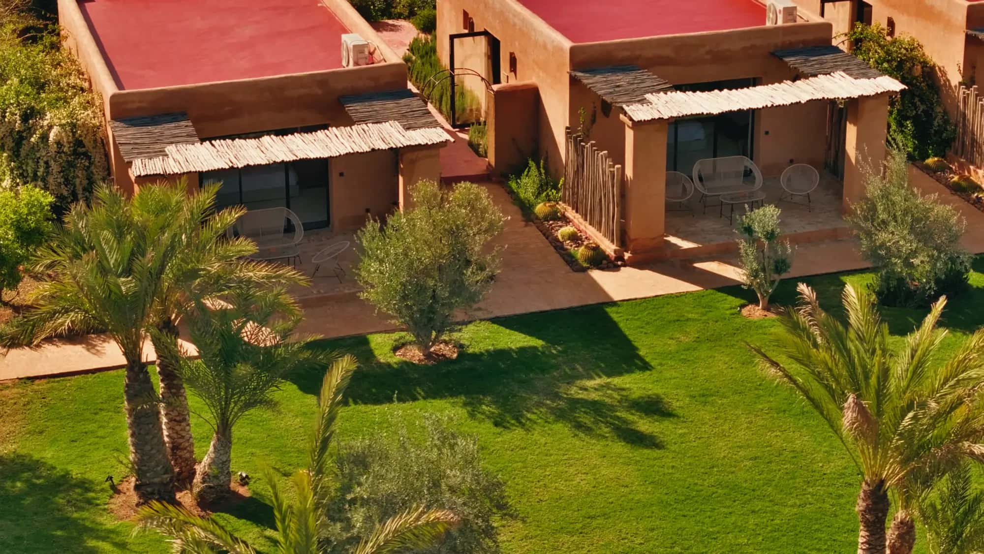 Drone view of the Villa Yemna suites with private terraces and gardens.
